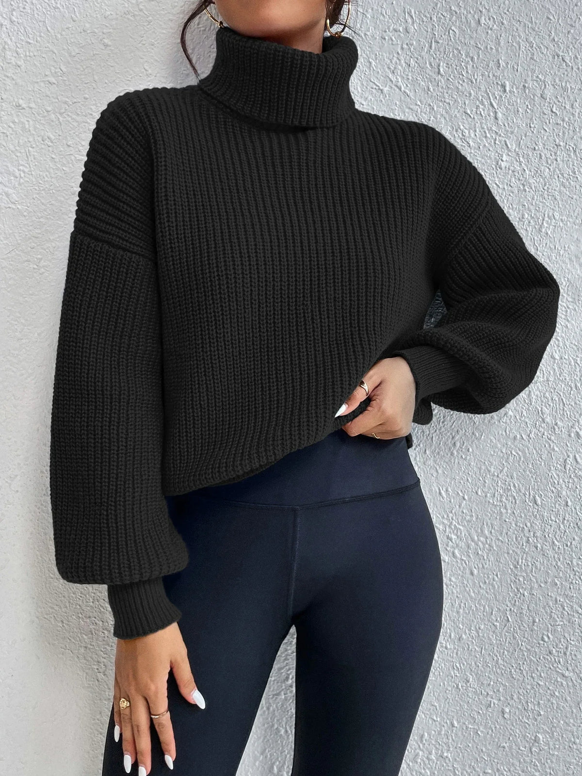 Suéter Feminino de Tricô com Gola Alta e Manga Bufante
