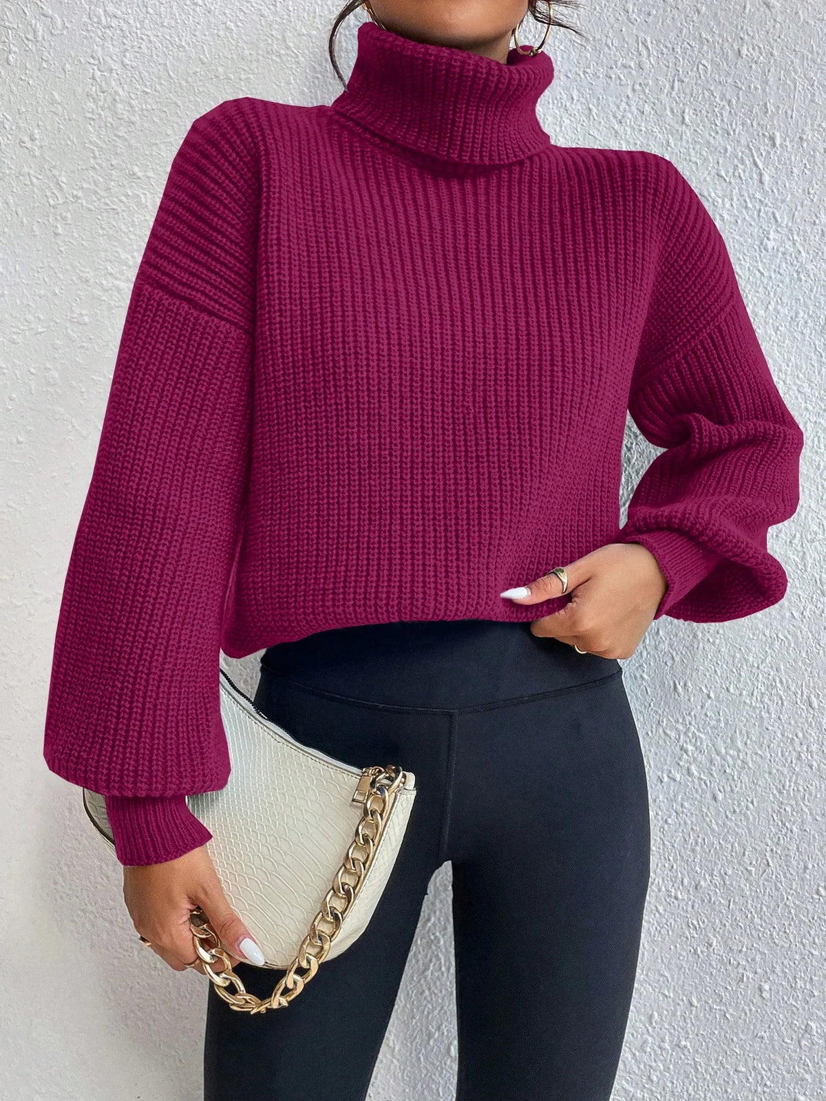 Suéter Feminino de Tricô com Gola Alta e Manga Bufante