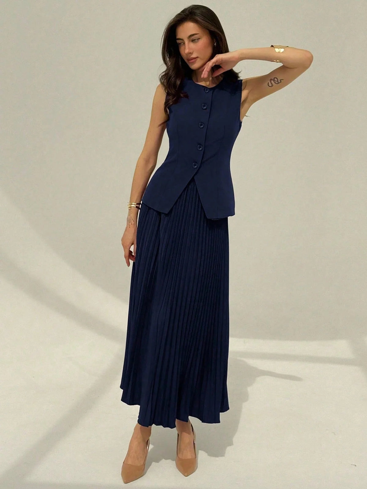 Conjunto Feminino Alfaiataria com Colete e Saia Plissada